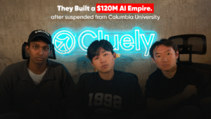 Three young male founders of Cluely AI, standing in front of a bright neon 'Cluely' sign. Overlay text reads 'They Built a $120M AI Empire. after suspended from Columbia University'